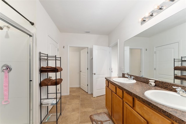 6646 SW 64th Ave, Ocala, FL 34476 - bathroom with a shower stall, double vanity, and tile patterned flooring