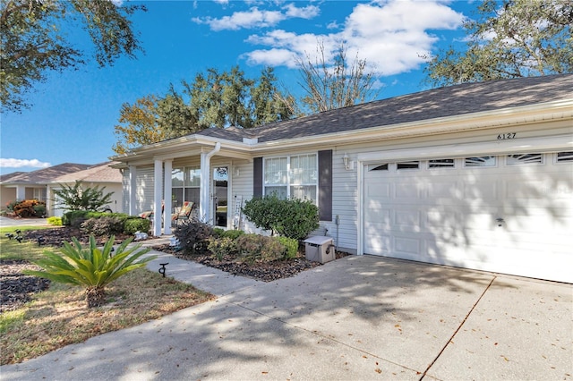 6127 SW 84th Place Rd, Ocala, FL 34476 - view of front of property featuring concrete driveway and an attached garage