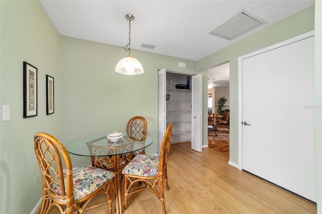 8431 SW 93rd Pl Unit F, Ocala, FL 34481 - dining area featuring light wood-style flooring and baseboards