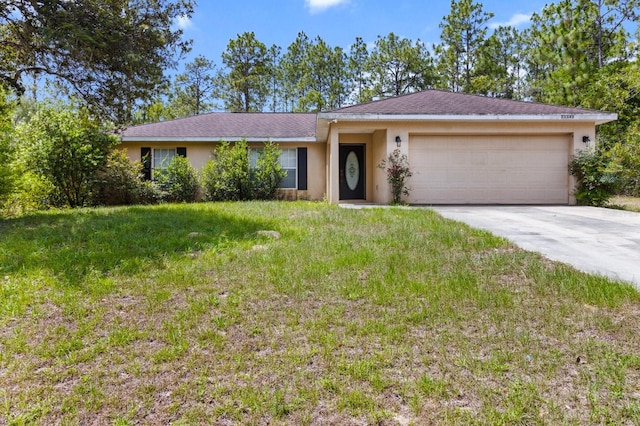 23340 NW Columbine Ave, Dunnellon, FL 34431 - single story home with a garage, stucco siding, concrete driveway, and a front yard