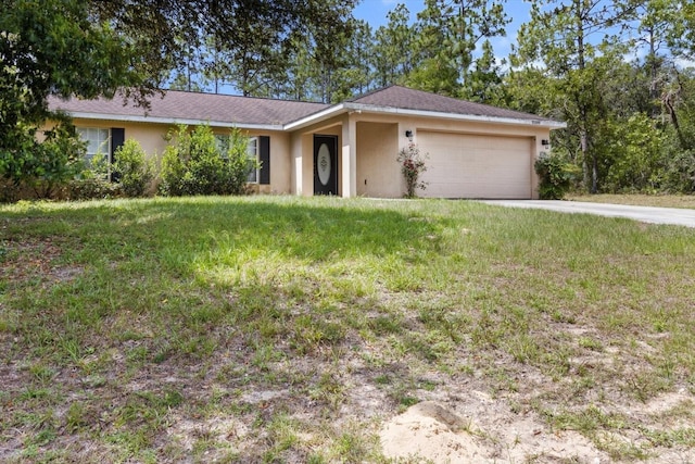 23340 NW Columbine Ave, Dunnellon, FL 34431 - ranch-style house featuring stucco siding, an attached garage, driveway, and a front yard