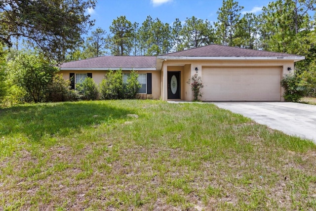 23340 NW Columbine Ave, Dunnellon, FL 34431 - single story home with stucco siding, a garage, concrete driveway, and a front yard