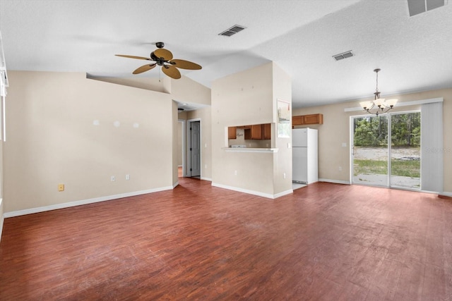 23340 NW Columbine Ave, Dunnellon, FL 34431 - unfurnished living room featuring a chandelier, wood finished floors, ceiling fan, baseboards, and vaulted ceiling