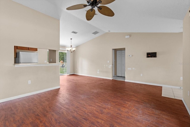 23340 NW Columbine Ave, Dunnellon, FL 34431 - unfurnished living room with a chandelier, ceiling fan, lofted ceiling, wood finished floors, and baseboards