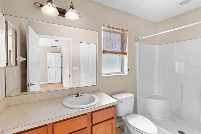 23340 NW Columbine Ave, Dunnellon, FL 34431 - full bath with toilet, vanity, and a shower