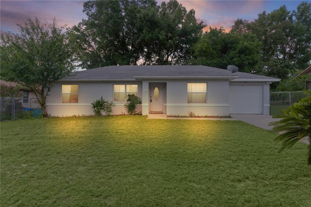 18 Banyan Pass, Ocala, FL 34472 - ranch-style house with a garage, stucco siding, and driveway