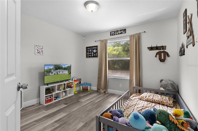 18 Banyan Pass, Ocala, FL 34472 - bedroom with wood finished floors and baseboards