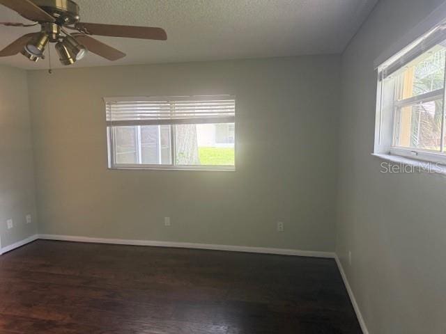 9722 SW 95th Ct Unit C, Ocala, FL 34481 - spare room with ceiling fan, wood finished floors, and a textured ceiling