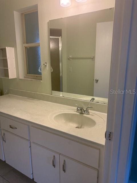9722 SW 95th Ct Unit C, Ocala, FL 34481 - full bathroom featuring vanity and a shower stall