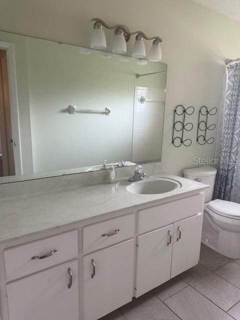 9722 SW 95th Ct Unit C, Ocala, FL 34481 - bathroom featuring vanity, tile patterned floors, and a shower with curtain