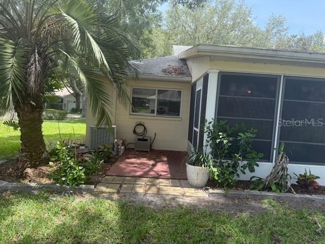 9722 SW 95th Ct Unit C, Ocala, FL 34481 - property entrance with a patio