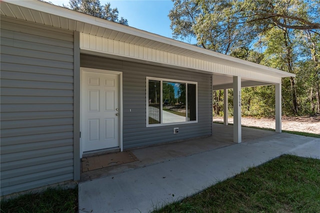 16615 SE 63rd Ln, Ocklawaha, FL 32179 - doorway to property featuring a patio