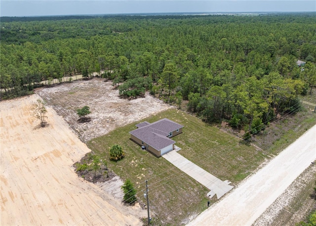 5331 SW 121st Ter, Ocala, FL 34481 - aerial view of property and surrounding area with a heavily wooded area
