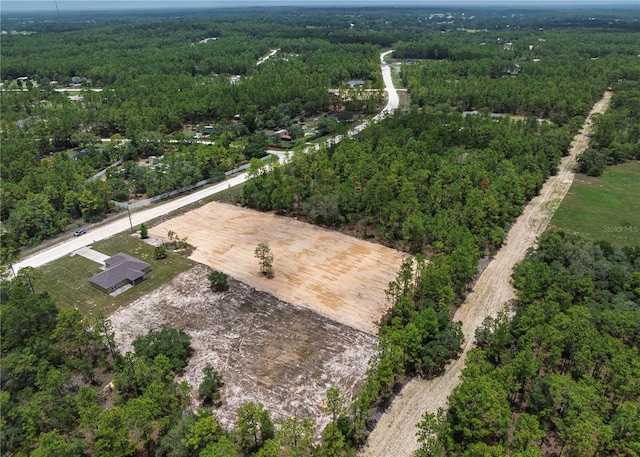 5331 SW 121st Ter, Ocala, FL 34481 - aerial view of property and surrounding area with a forest