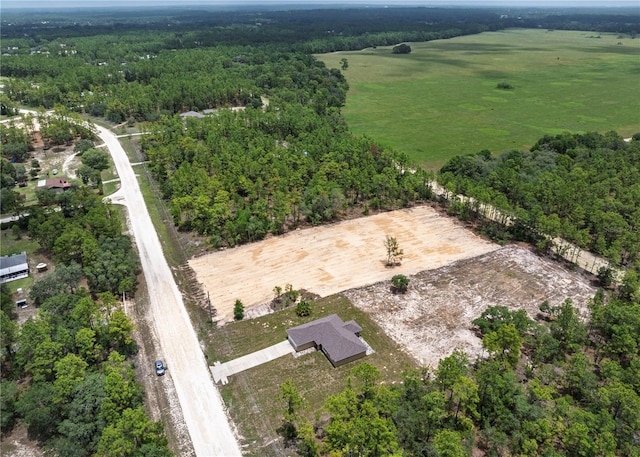 5331 SW 121st Ter, Ocala, FL 34481 - aerial overview of property's location with rural landscape and a heavily wooded area