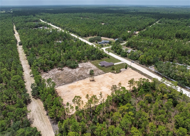5331 SW 121st Ter, Ocala, FL 34481 - aerial overview of property's location featuring a heavily wooded area