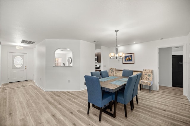 9735 SW 96th St, Ocala, FL 34481 - dining space featuring light wood-type flooring, a chandelier, and recessed lighting