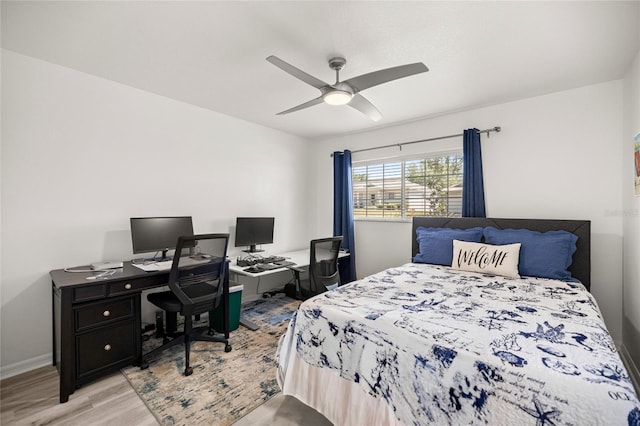 9735 SW 96th St, Ocala, FL 34481 - bedroom featuring a desk, wood finished floors, and ceiling fan