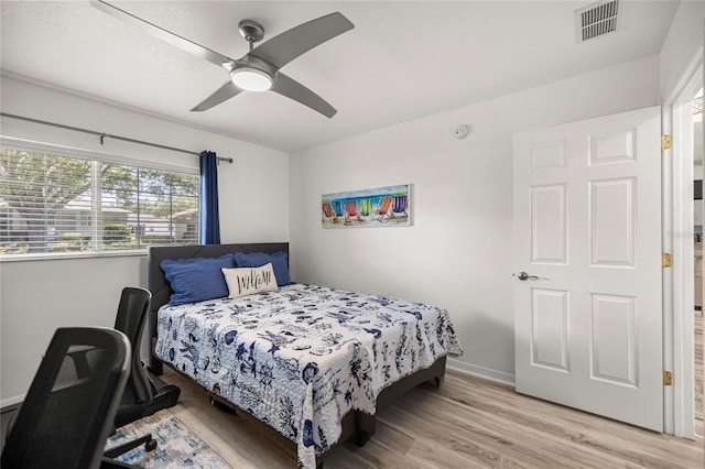 9735 SW 96th St, Ocala, FL 34481 - bedroom featuring light wood-style flooring and ceiling fan