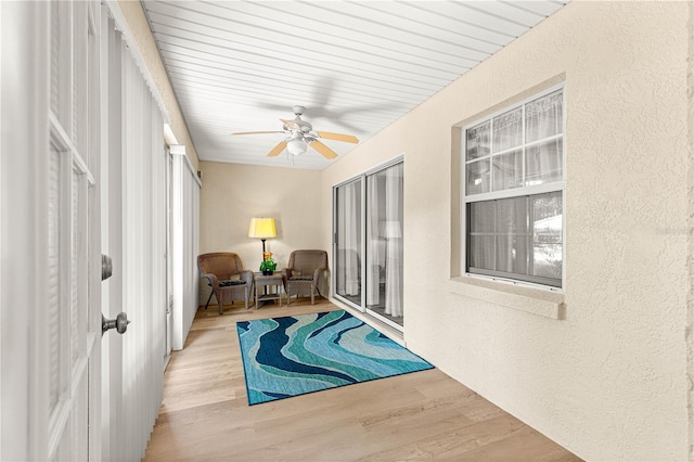 8034 SW 81st Loop, Ocala, FL 34476 - sunroom with wood finished floors and a textured wall