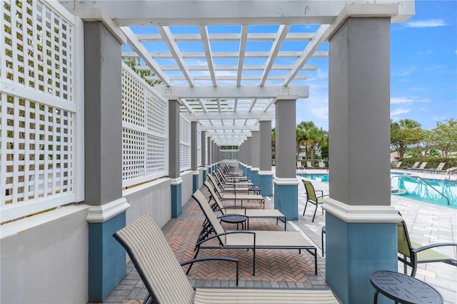 8034 SW 81st Loop, Ocala, FL 34476 - view of patio / terrace featuring a pergola and a community pool