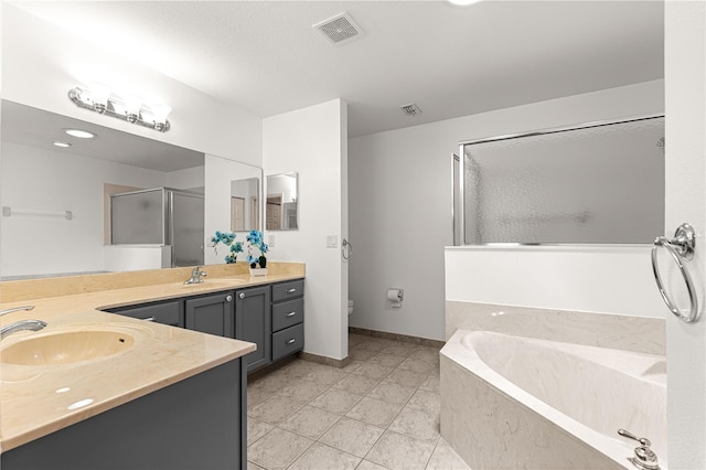 8034 SW 81st Loop, Ocala, FL 34476 - full bath featuring vanity, a garden tub, tile patterned flooring, and a stall shower