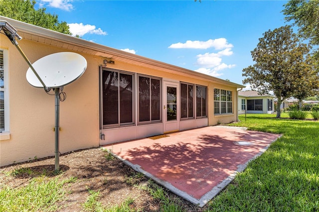 8034 SW 81st Loop, Ocala, FL 34476 - back of house featuring a patio, a yard, and stucco siding