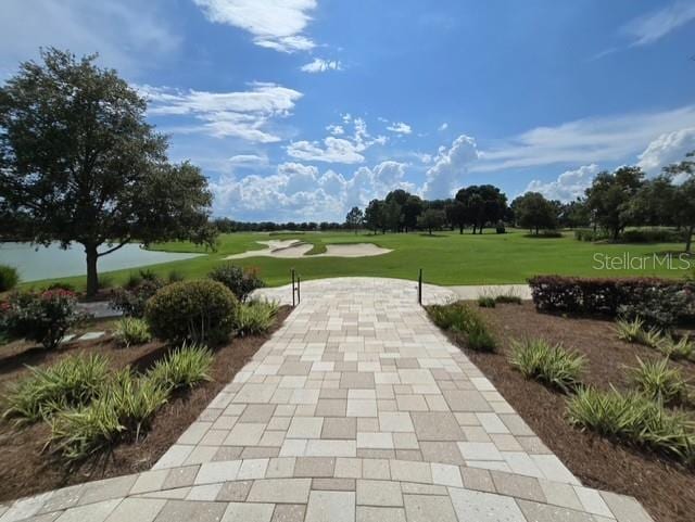 4232 NW 56th Ct, Ocala, FL 34482 - view of home's community with a yard and golf course view