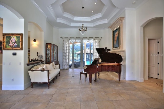 695 SE 47th Loop, Ocala, FL 34480 - sitting room with arched walkways, light tile patterned flooring, ornamental molding, a chandelier, and a tray ceiling