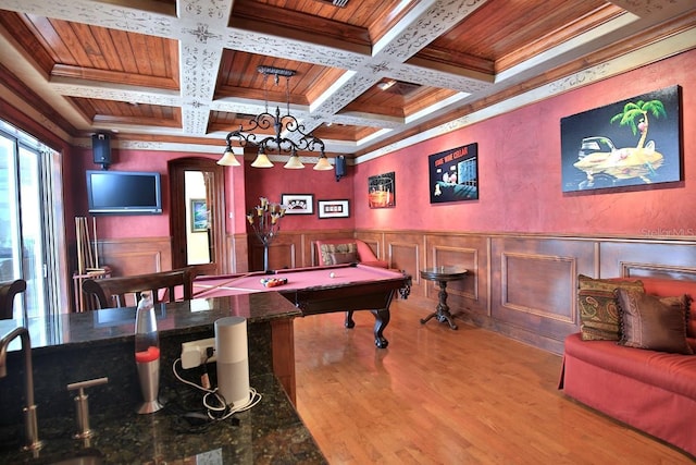 695 SE 47th Loop, Ocala, FL 34480 - rec room with wood finished floors, crown molding, coffered ceiling, a wainscoted wall, and a wooden ceiling with exposed beams