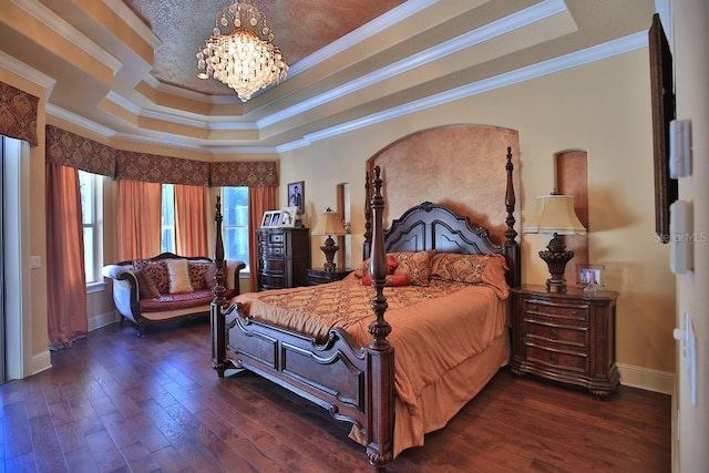 695 SE 47th Loop, Ocala, FL 34480 - bedroom with a raised ceiling, a chandelier, ornamental molding, and wood finished floors