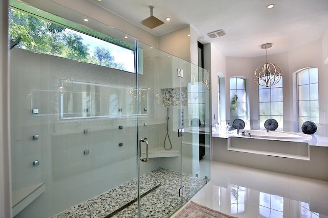 695 SE 47th Loop, Ocala, FL 34480 - full bathroom featuring a chandelier, a stall shower, a bath, and recessed lighting