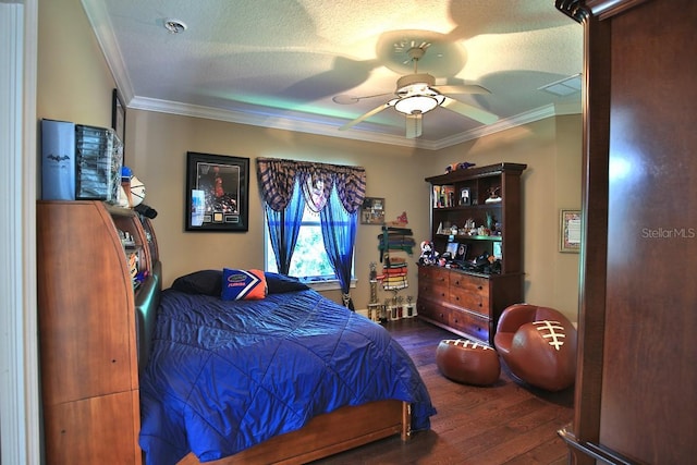 695 SE 47th Loop, Ocala, FL 34480 - bedroom featuring ornamental molding, wood finished floors, ceiling fan, and a textured ceiling