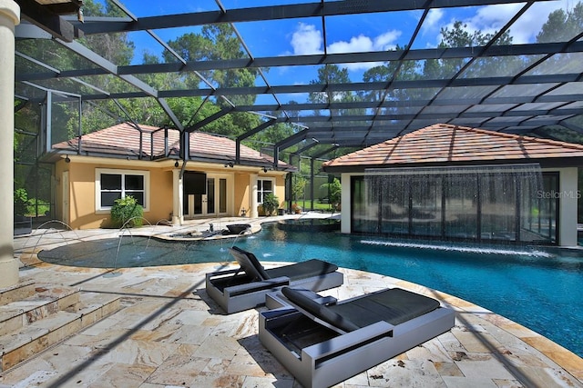 695 SE 47th Loop, Ocala, FL 34480 - view of pool with french doors, a patio, a pool with connected hot tub, and a lanai