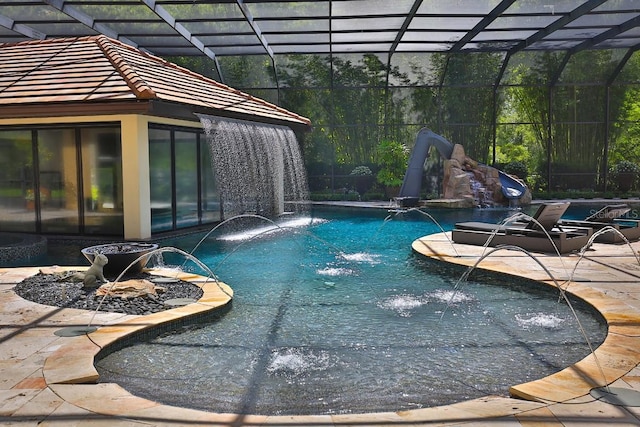 695 SE 47th Loop, Ocala, FL 34480 - swimming pool with a patio and glass enclosure