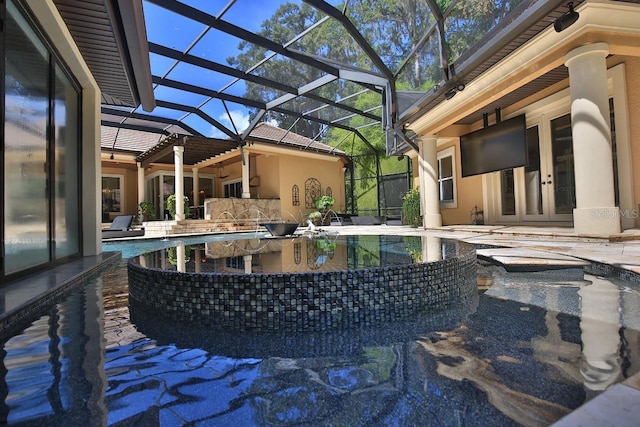 695 SE 47th Loop, Ocala, FL 34480 - swimming pool featuring ceiling fan, a patio, a jacuzzi, and a lanai