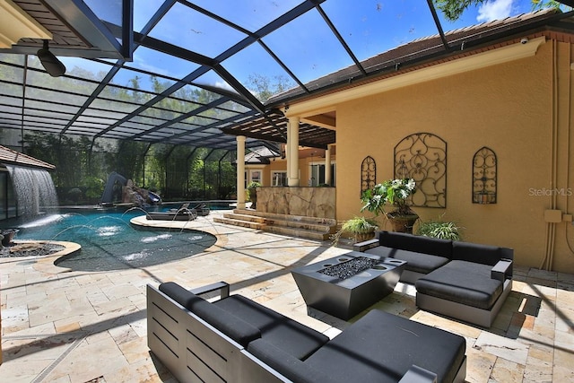 695 SE 47th Loop, Ocala, FL 34480 - view of patio / terrace with a hot tub, an outdoor living space with a fire pit, an outdoor pool, and glass enclosure