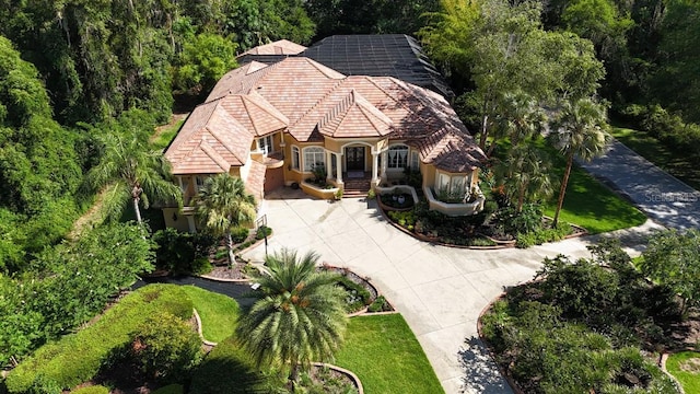 695 SE 47th Loop, Ocala, FL 34480 - view from above of property featuring a heavily wooded area