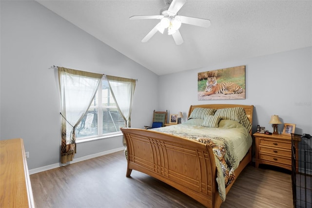 1584 Silhouette Dr, Clermont, FL 34711 - bedroom with wood finished floors, vaulted ceiling, and ceiling fan