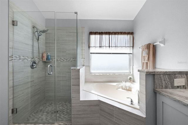 1584 Silhouette Dr, Clermont, FL 34711 - bathroom with a garden tub, a stall shower, and vanity