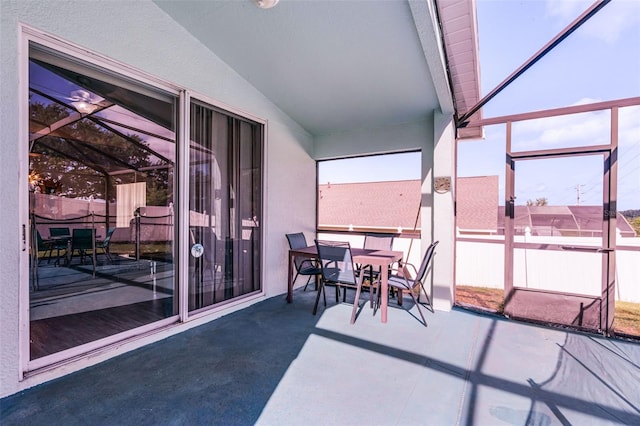 1584 Silhouette Dr, Clermont, FL 34711 - sunroom featuring outdoor dining area and vaulted ceiling