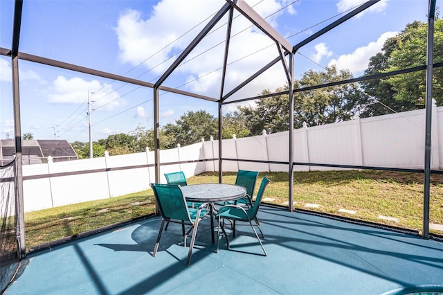 1584 Silhouette Dr, Clermont, FL 34711 - fenced backyard featuring a patio and outdoor dining area