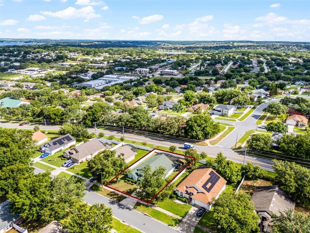 1584 Silhouette Dr, Clermont, FL 34711 - aerial perspective of suburban area with property parcel outlined