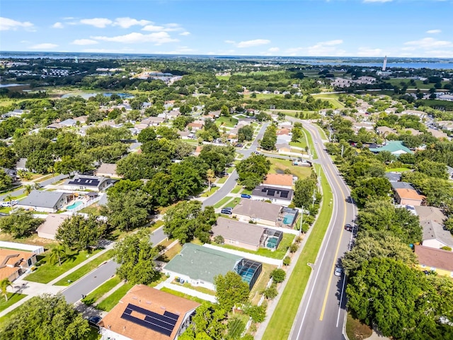 1584 Silhouette Dr, Clermont, FL 34711 - aerial perspective of suburban area featuring a large body of water