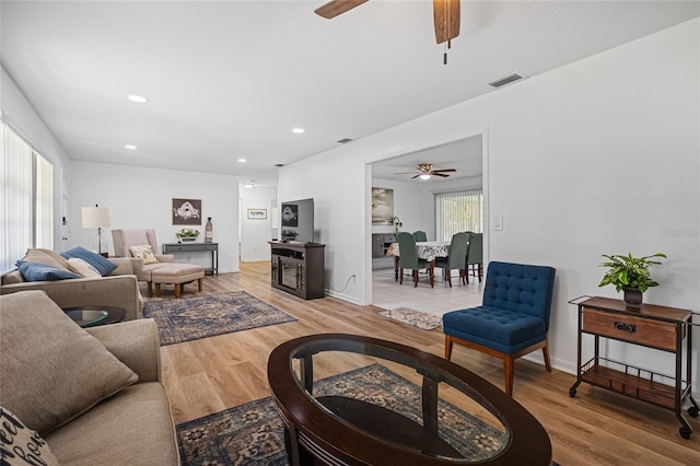 12178 Palmetto Way, Dunnellon, FL 34432 - living area featuring ceiling fan, light wood-style flooring, and recessed lighting