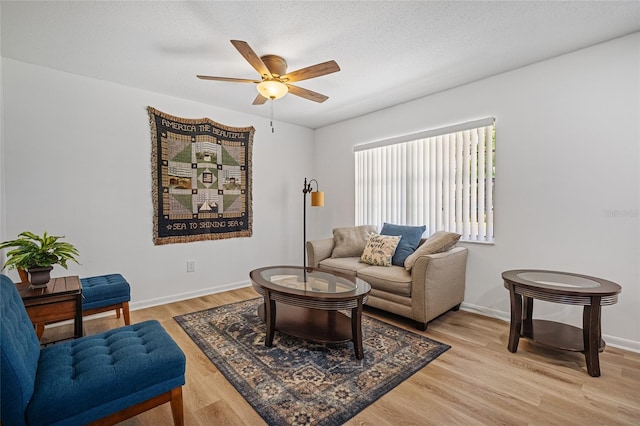 12178 Palmetto Way, Dunnellon, FL 34432 - living area with ceiling fan and light wood-style floors