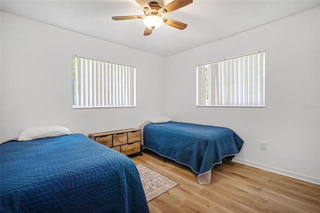 12178 Palmetto Way, Dunnellon, FL 34432 - bedroom featuring wood finished floors and ceiling fan
