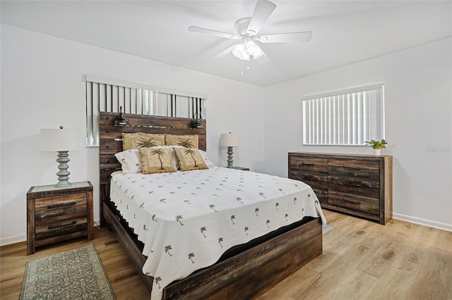 12178 Palmetto Way, Dunnellon, FL 34432 - bedroom featuring wood finished floors and ceiling fan