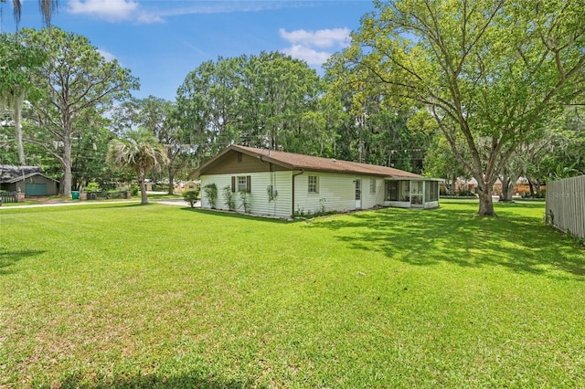 12178 Palmetto Way, Dunnellon, FL 34432 - view of yard featuring a sunroom