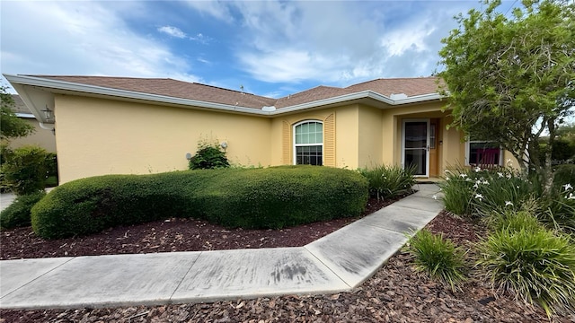 9490 SW 94th Ct, Ocala, FL 34481 - view of front of home with stucco siding